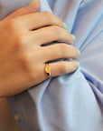 Oval yellow gold signet ring