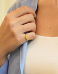 Round yellow gold signet ring