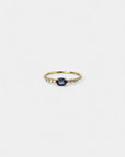 Ring with blue sapphire and white diamonds
