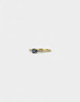 Ring with blue sapphire and white diamonds