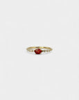 Ring with orange red sapphire and white diamonds