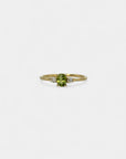 Ring with central green sapphire and white diamonds