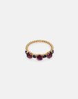 Anello in oro rosa con rodolite e zaffiri blu