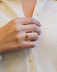Yellow gold ring with champagne diamond and decorated bezel