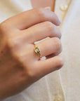 Yellow gold ring with champagne diamond and cushion setting