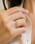 Champagne diamond yellow gold ring with spiral shank
