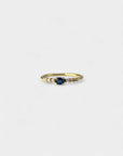 Yellow gold ring with blue sapphire and white diamonds
