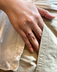 Yellow gold ring with vertical ruby and white diamonds