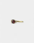 Yellow gold ring with cabochon garnet and white diamonds