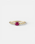 Yellow gold ring with ruby and round elements with white diamonds