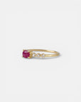 Yellow gold ring with ruby and round elements with white diamonds