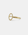 Yellow gold ring with oval profile of white diamonds