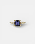 Yellow gold ring with square iolite and white diamonds