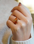 Yellow gold ring with square Madeira quartz and white diamonds