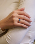 Yellow gold ring with square London topaz and white diamonds