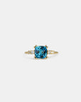 Yellow gold ring with square London topaz and white diamonds