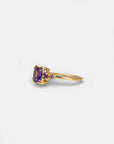Yellow gold ring with square amethyst and side amethysts