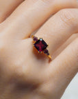 Yellow gold ring with square rhodolite and side rhodolites and tourmalines