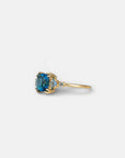 Yellow gold ring with square London blue topaz and side topaz and aquamarine