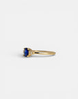 Yellow gold ring with rose-cut blue sapphire and white diamonds