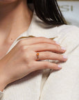 Anello in oro giallo con zaffiro giallo taglio rosetta e diamanti bianchi