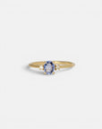 Yellow gold ring with cornflower blue sapphire and white diamonds