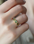 Yellow gold ring with oval rose-cut green sapphires and white diamonds