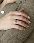 Yellow gold ring with oval rose-cut green sapphires and white diamonds