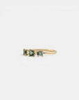 Yellow gold ring with square teal tourmalines and white diamonds