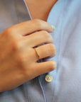 Yellow gold ring with trilogy of diamonds