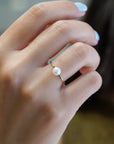 Anello in oro giallo con perla naturale