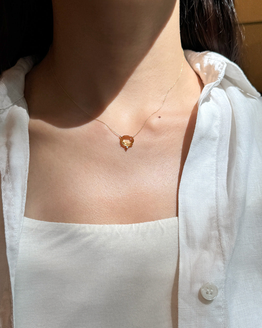 Collana in oro giallo con citrino e diamante bianco