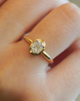 Yellow gold ring with oval composition of diamonds