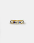 Yellow gold ring with aquamarine and blue sapphires