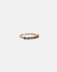 Rose gold ring with blue sapphires
