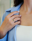 Yellow gold ring with vertical oval emerald