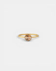 Yellow gold ring with champagne diamond and decorated bezel
