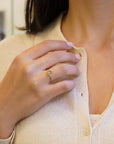 Yellow gold ring with champagne diamond and decorated bezel