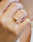 Champagne diamond yellow gold ring with spiral shank