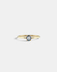 Ring with light blue sapphire and white diamonds