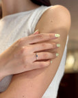 Yellow gold ring with blue sapphire and white diamonds
