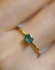 Yellow gold ring with horizontal oval emerald
