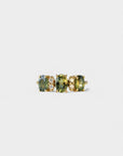 Ring with oval green sapphires and white diamonds