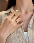 Yellow gold ring with horizontal ruby ​​and white diamonds
