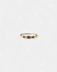 Yellow gold ring with rhodolites and white diamonds