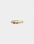 Yellow gold ring with rhodolites and white diamonds