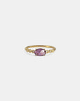 Yellow gold ring with pink sapphire and round elements with white diamonds