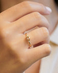 Yellow gold ring with vertical oval champagne diamond and white diamonds
