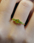 Yellow gold ring with five gradient stones - Peridot