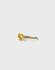 Yellow gold ring with heart-shaped yellow synthetic corundum and two white diamonds